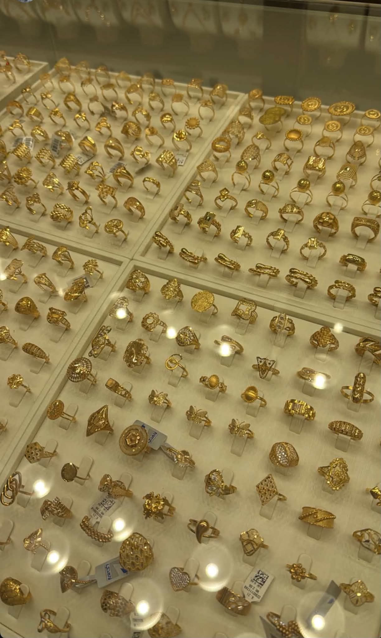 Gold ring selection arranged in a display case